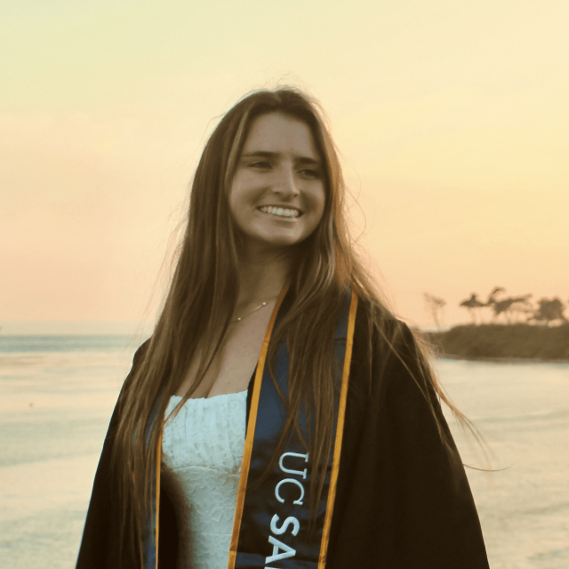 Maddie in front of the ocean.